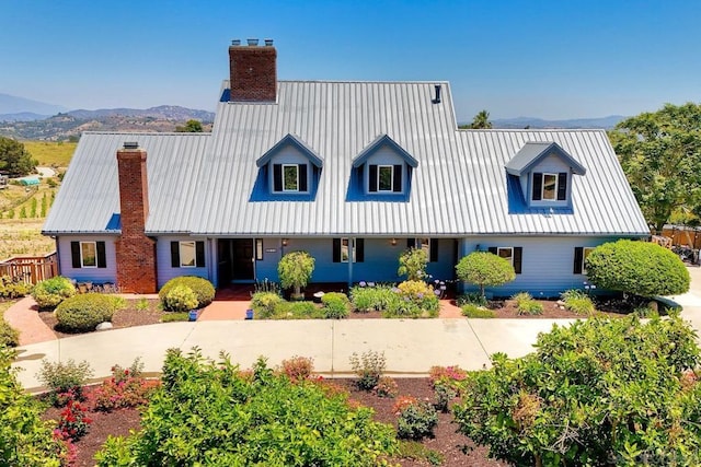 exterior space featuring a mountain view