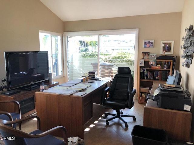 office space featuring lofted ceiling