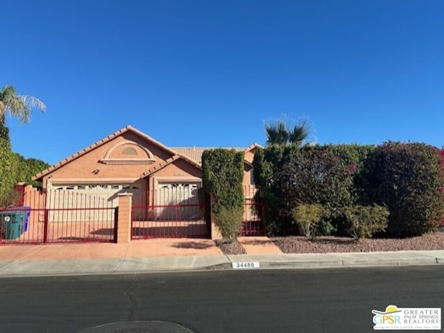 view of front of home with a garage