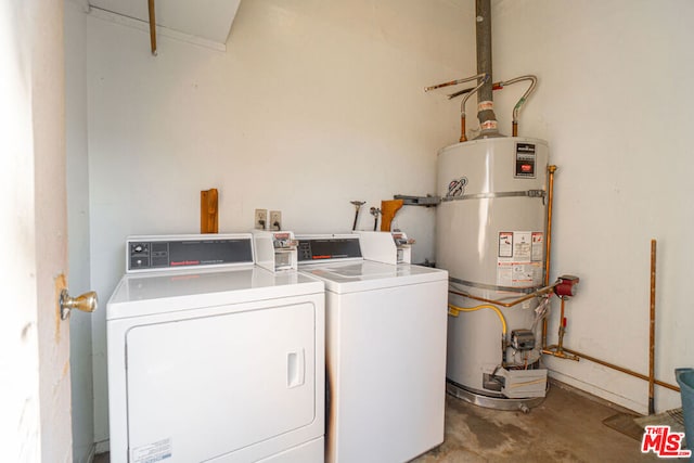 clothes washing area with secured water heater and separate washer and dryer