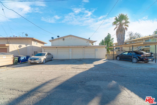 exterior space with a garage