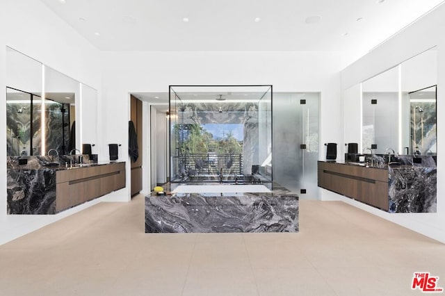 bathroom featuring vanity, tile patterned floors, and independent shower and bath