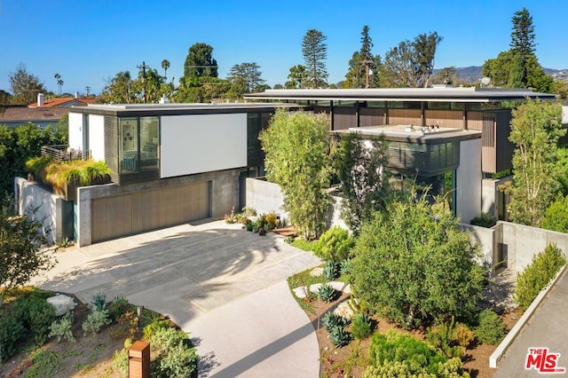 modern home featuring a garage