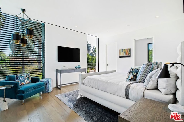 bedroom featuring light hardwood / wood-style floors