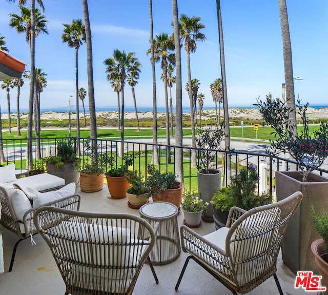 sunroom with a water view