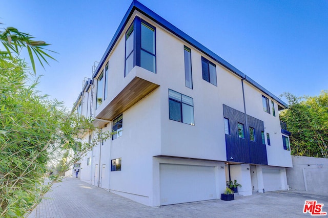 view of home's exterior with a garage