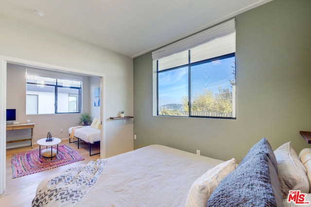 bedroom featuring hardwood / wood-style floors