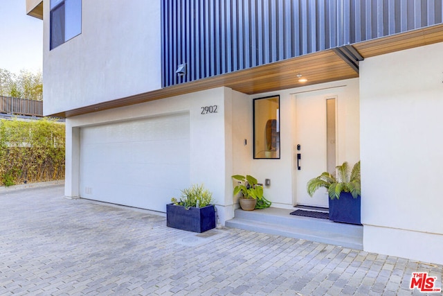 entrance to property with a garage