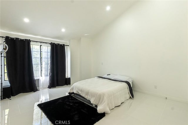 bedroom featuring recessed lighting and baseboards