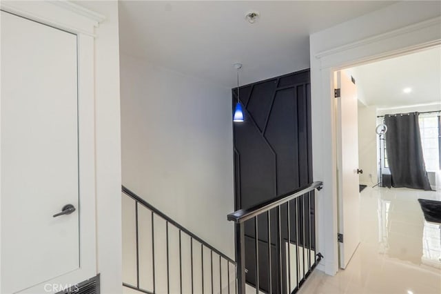 staircase with tile patterned floors