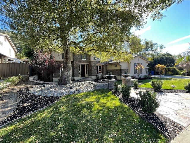 view of front of property featuring a front yard