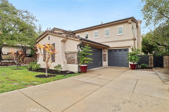 view of front facade featuring a garage and a front lawn