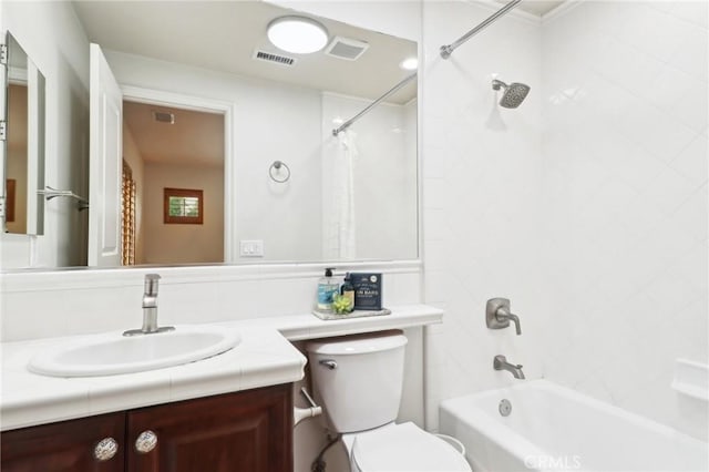 full bathroom with vanity, toilet, and shower / bath combo