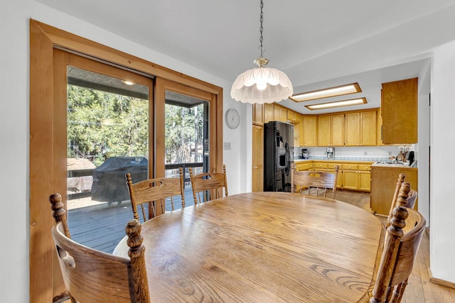 dining room featuring light hardwood / wood-style floors