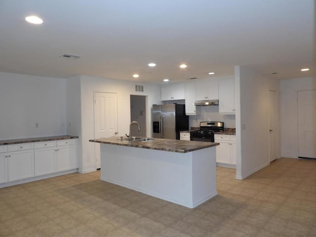 kitchen with white cabinetry, sink, an island with sink, and stainless steel appliances