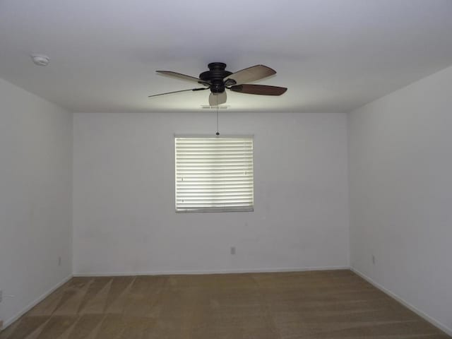 empty room with carpet flooring