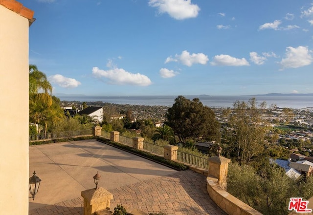 view of patio / terrace featuring a water view