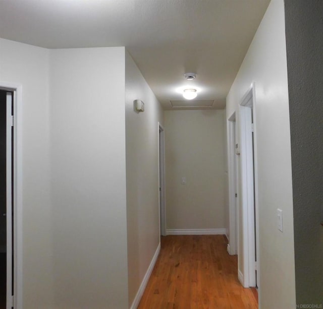 corridor featuring light wood-type flooring