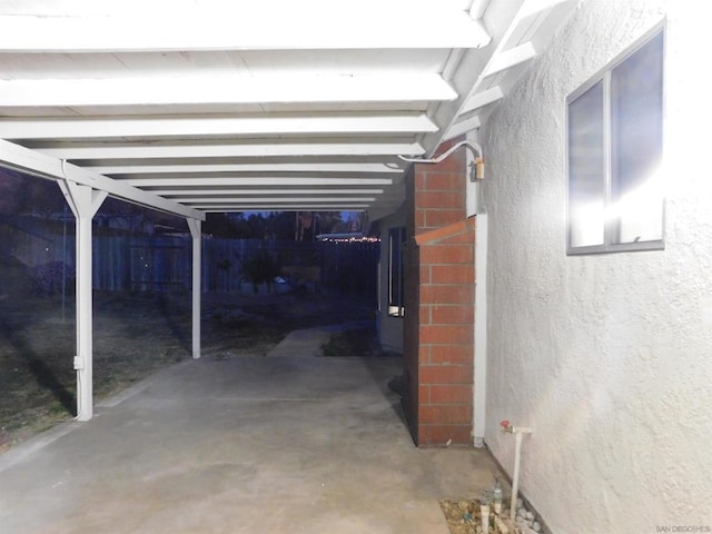 view of parking with a carport