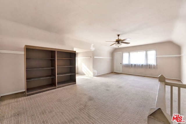 bonus room featuring carpet, vaulted ceiling, and ceiling fan