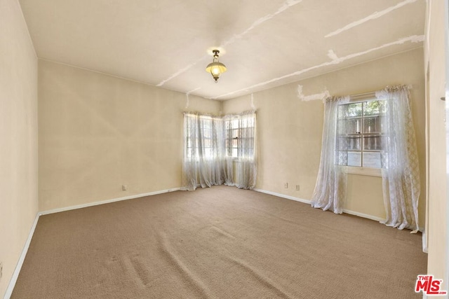 view of carpeted spare room