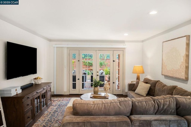 living room with wood-type flooring and french doors