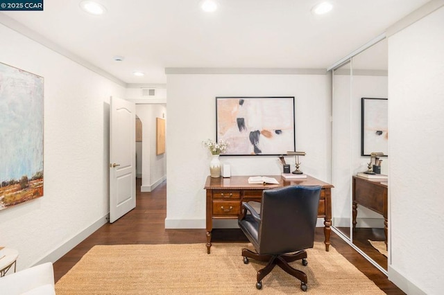 office with dark hardwood / wood-style floors