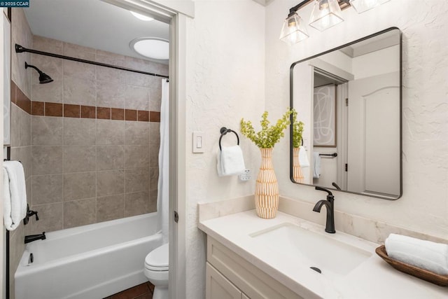 full bathroom with shower / bath combination with curtain, vanity, and toilet