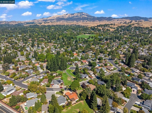 drone / aerial view featuring a mountain view