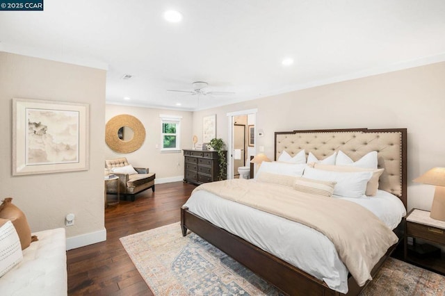 bedroom with dark hardwood / wood-style flooring, ensuite bath, ornamental molding, and ceiling fan