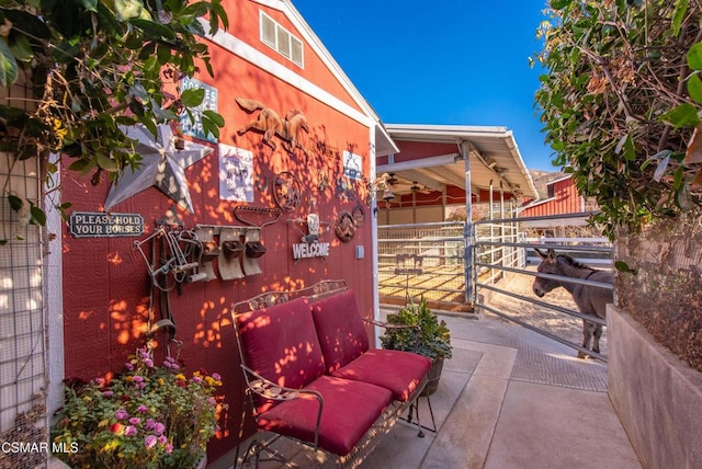 view of patio with an outdoor structure