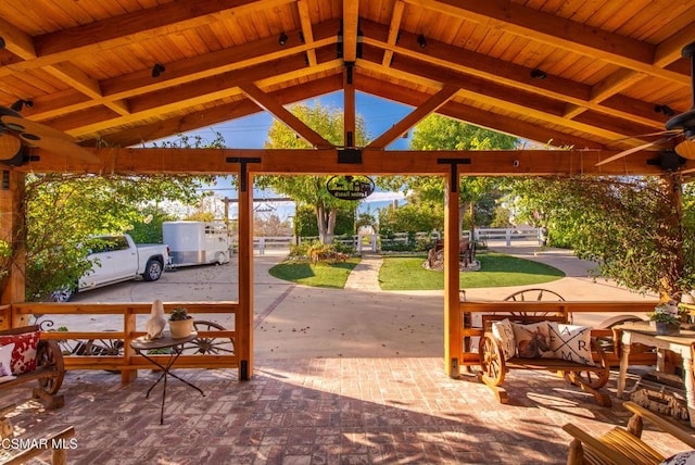 view of patio with a gazebo and ceiling fan