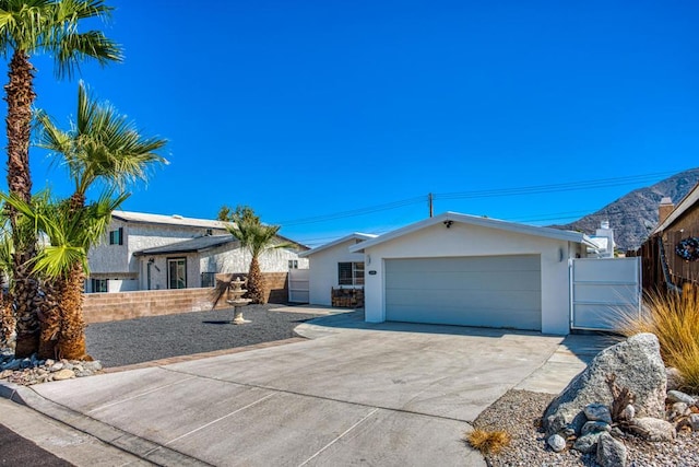 ranch-style home with a garage