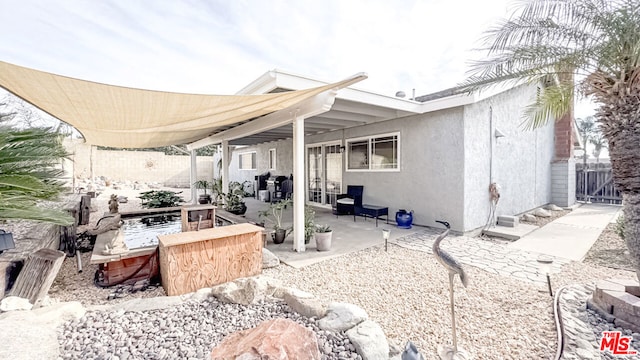 exterior space with a patio area