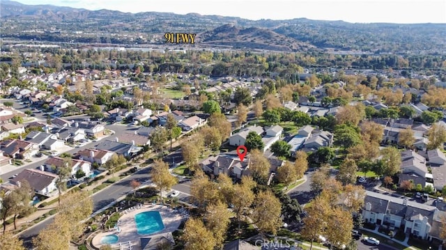 drone / aerial view featuring a mountain view