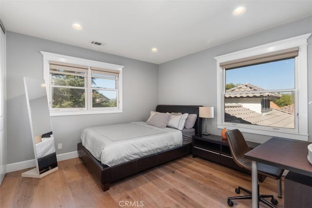 bedroom featuring wood-type flooring