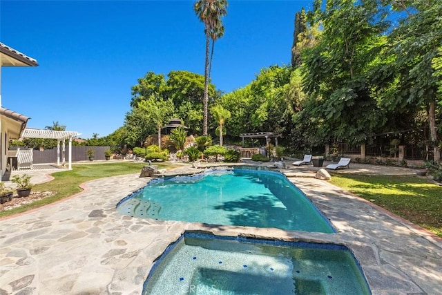 view of pool with a patio, an in ground hot tub, and a pergola