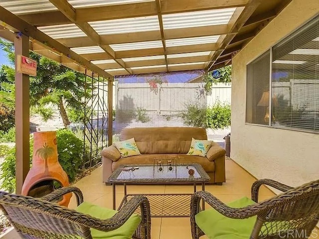 view of patio with an outdoor hangout area and a pergola