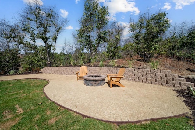 view of patio featuring an outdoor fire pit