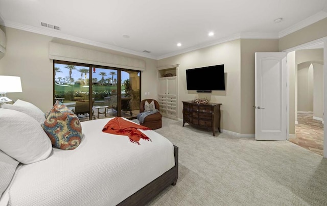 carpeted bedroom with access to outside and ornamental molding