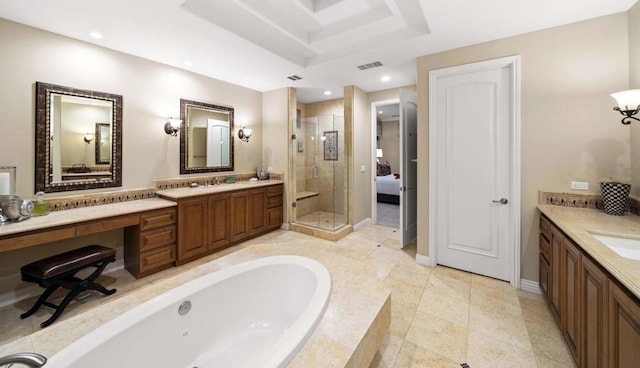 bathroom with shower with separate bathtub, vanity, a raised ceiling, and tile patterned floors