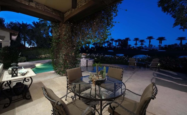 view of patio at twilight