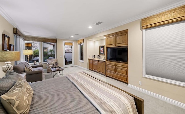 bedroom with light carpet and crown molding