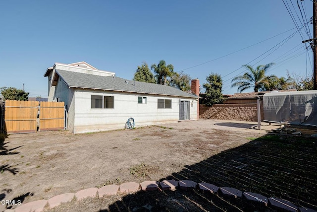 back of house featuring a patio