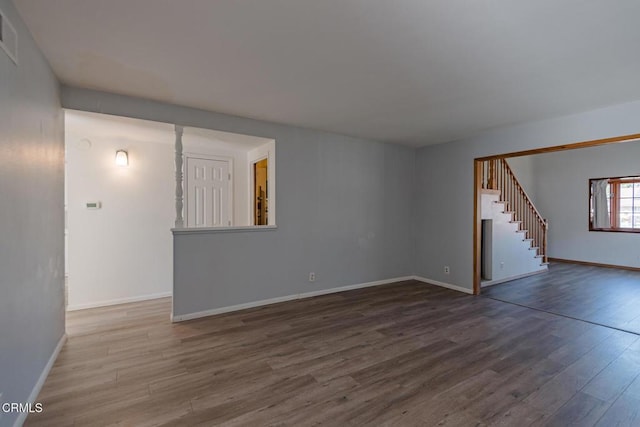 spare room featuring hardwood / wood-style flooring