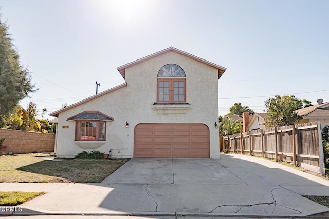 mediterranean / spanish-style home featuring a garage