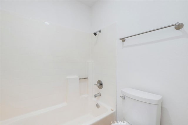 bathroom with toilet and shower / bathtub combination