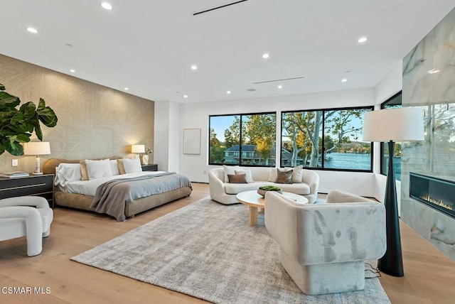 bedroom with light hardwood / wood-style floors