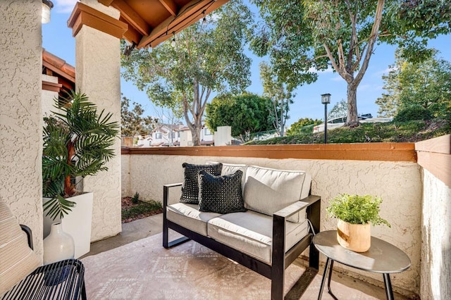 balcony featuring an outdoor hangout area and a patio