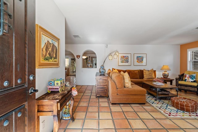 living room featuring light tile patterned flooring